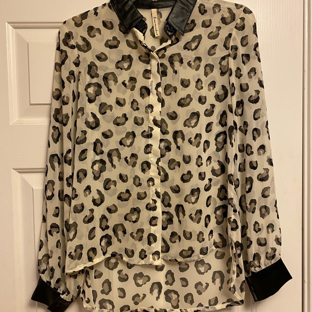 Sheer leopard top with leather detail